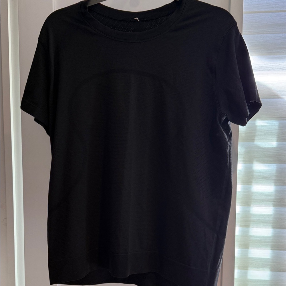 Women’s Black Swiftly athletic t shirt